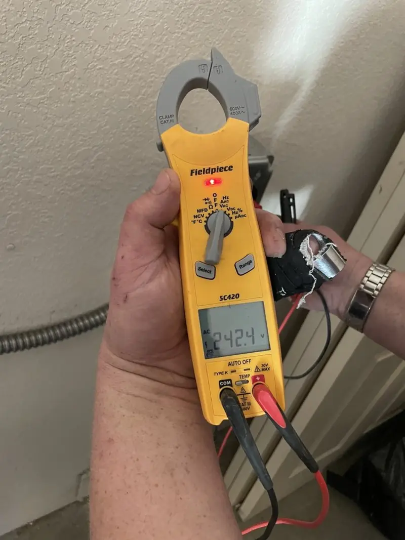 Voltage testing with clamp meter during Electrical Installation Services in Temescal Valley